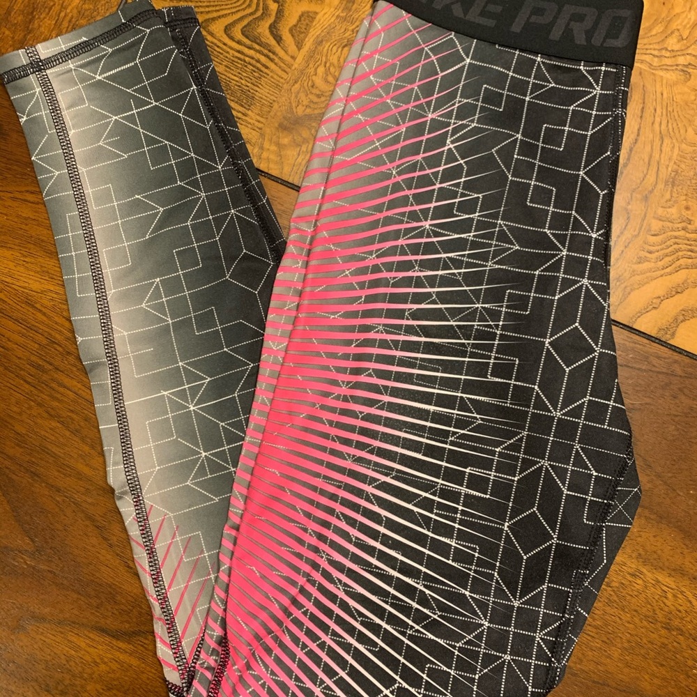 Pink and black Nike Pro leggings.